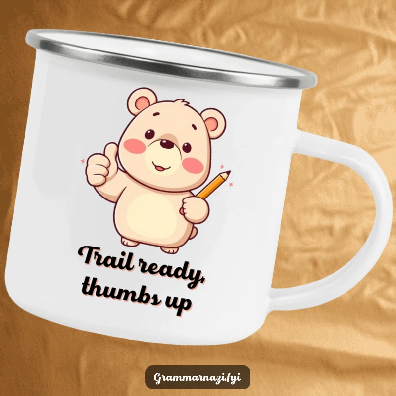 Funny camping mug with a happy bear character giving a thumbs up and holding a pencil, ready for the outdoors.