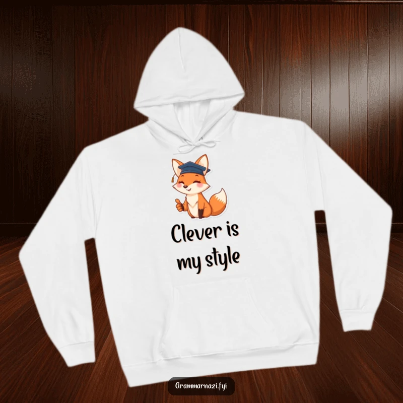 Funny hoodie with a cheerful fox wearing a tiny graduation cap and giving a thumbs up, ideal for grads.