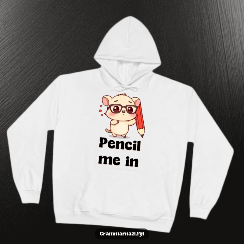 Funny hoodie featuring a small, determined creature with spectacles emphatically pointing at a floating, red pencil.