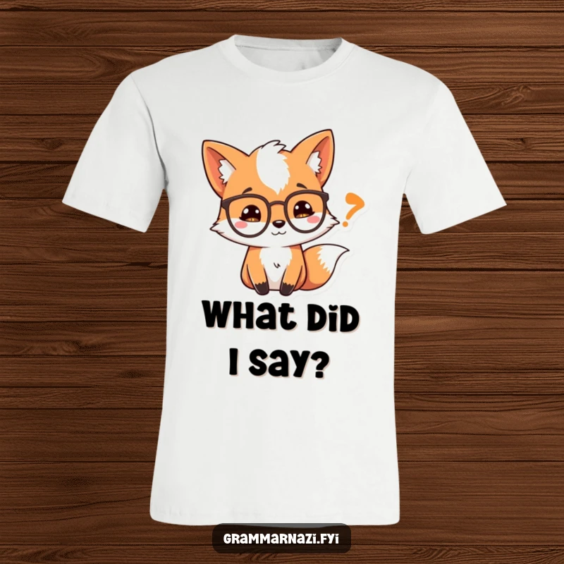 Funny T-Shirt: A curious fox with spectacles examines a quotation mark, symbolizing a deep dive into text.