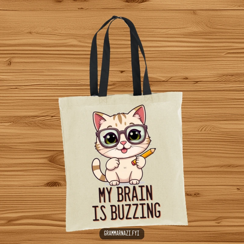 Funny cat with oversized glasses tapping a pencil, on a tote bag, for carrying books and daily essentials with wit.